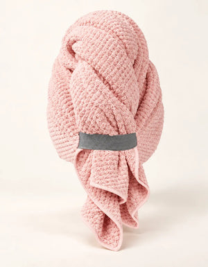 Pink BELARO quick-dry hair towel wrap with elastic strap on a cream background