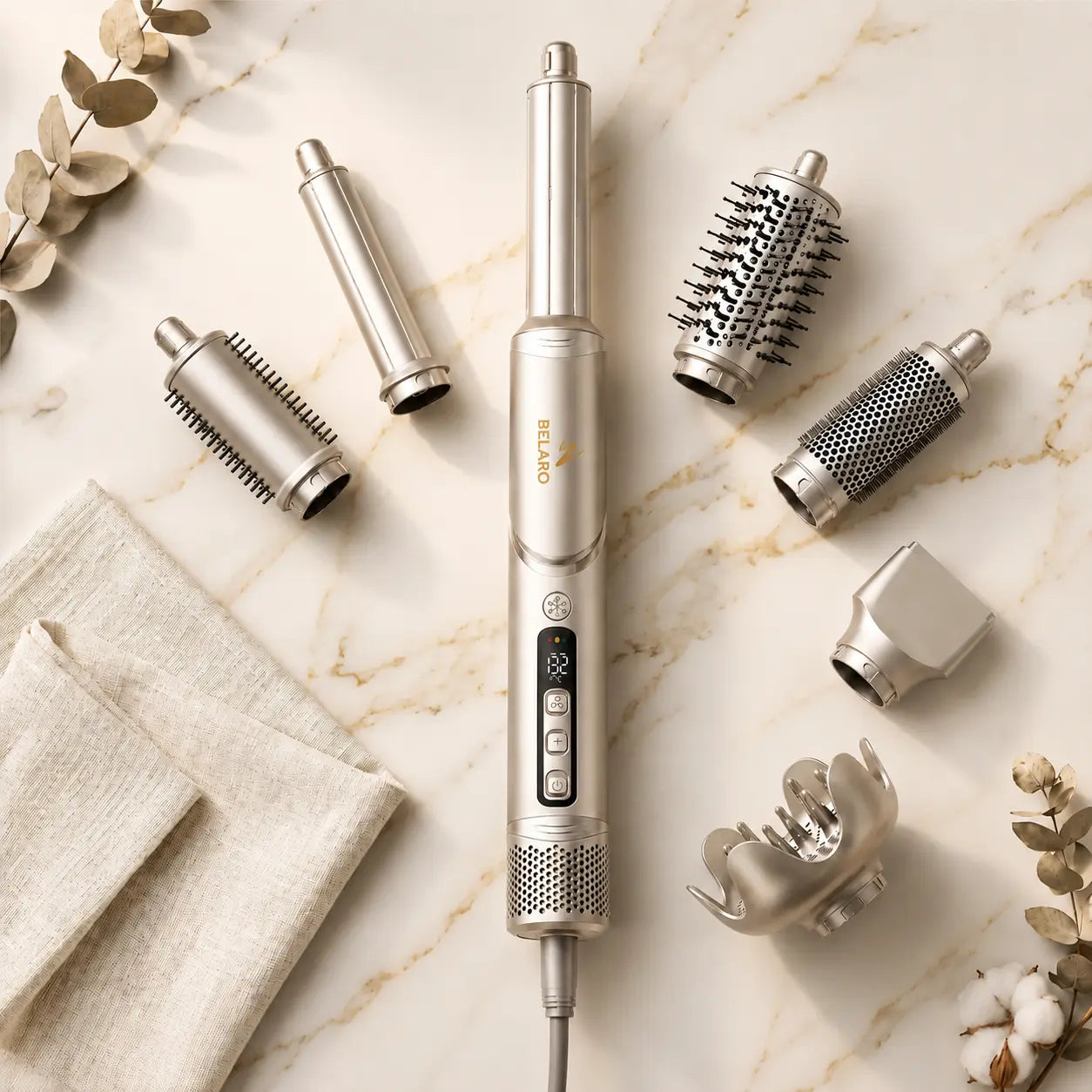 BELARO 8-in-1 Hair Styling Tool in Champagne Gold with eight interchangeable styling attachments displayed on a marble surface.