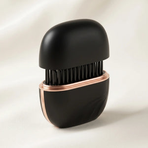 BELARO compact cordless hairbrush in black with rose gold accents