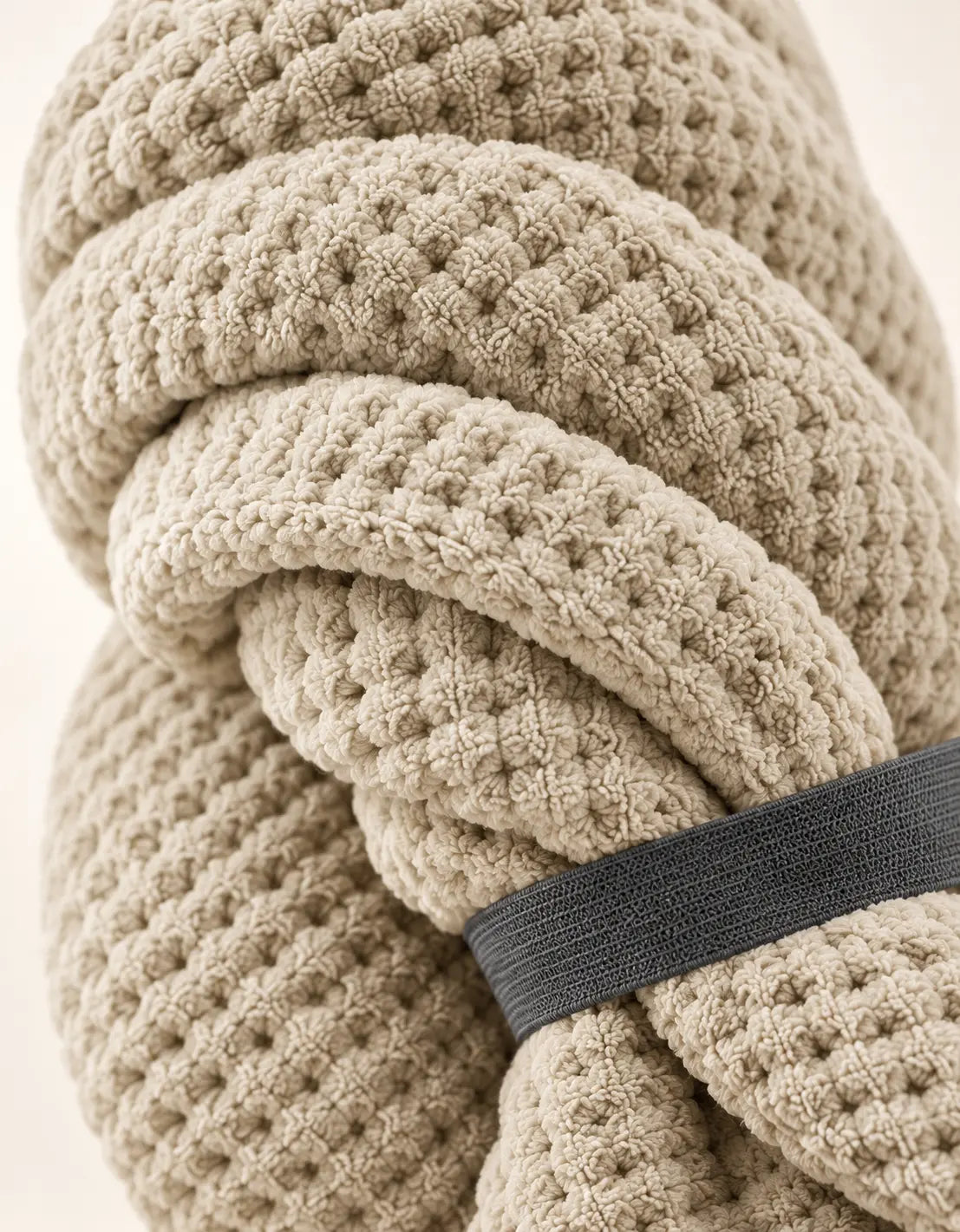 Close-up of the soft microfiber texture of the beige BELARO hair towel wrap